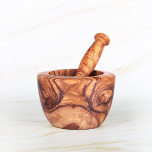 Handmade olive wood mortar and pestle with natural grain