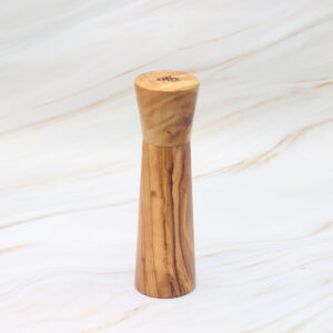 Handmade olive wood pepper mill with rustic Mediterranean grain