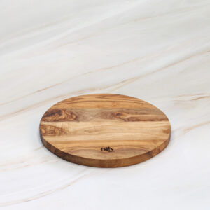 Handmade olive wood round cutting board with natural Mediterranean grain