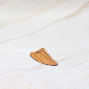 Handmade olive wood gua sha for natural facial massage